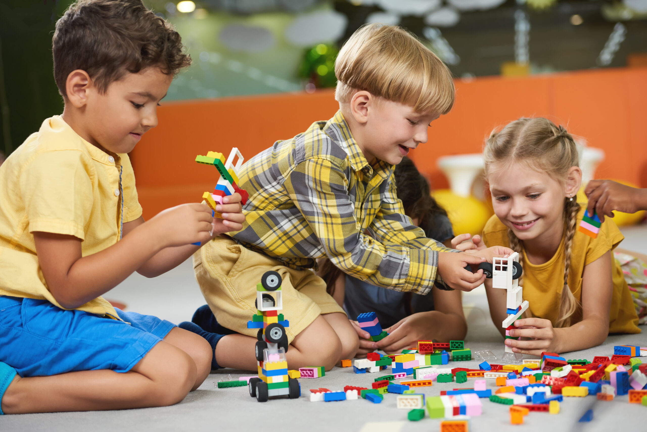 Start 26 little kids playing with constructor toys on the f 2026 03 09 06 03 55 utc