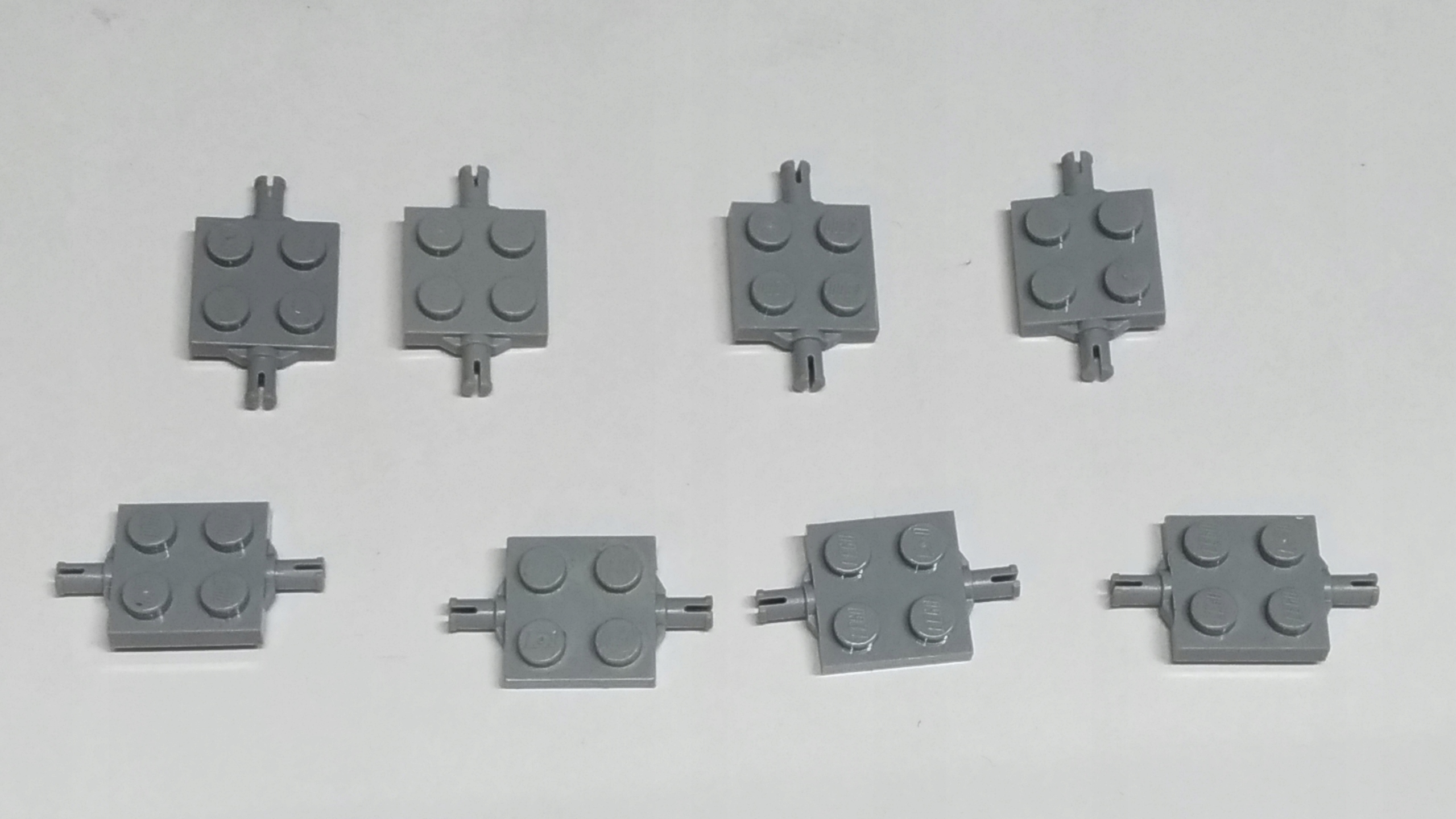 150d. Lego 4600 Płytka 2x2 z osią szare - 8 SZT 2 99f84177fc88f9c7b9dedad3a62c3369
