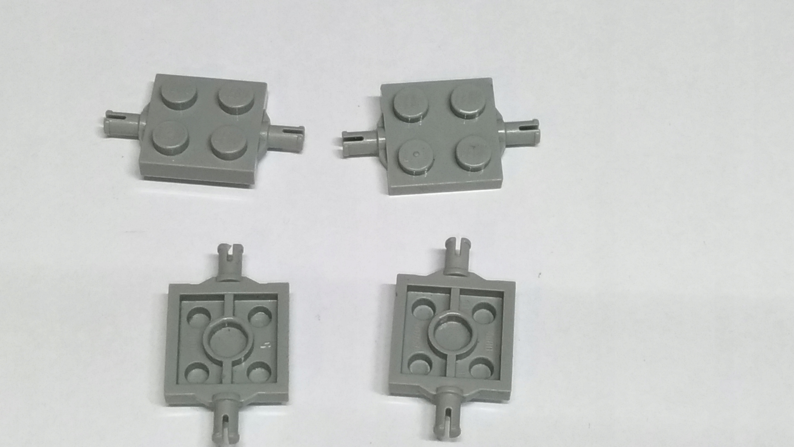 150e. Lego 4600 Płytka 2x2 z osią szary stary 4szt 2 2545624249a5ff847ff6ffe0949ead45