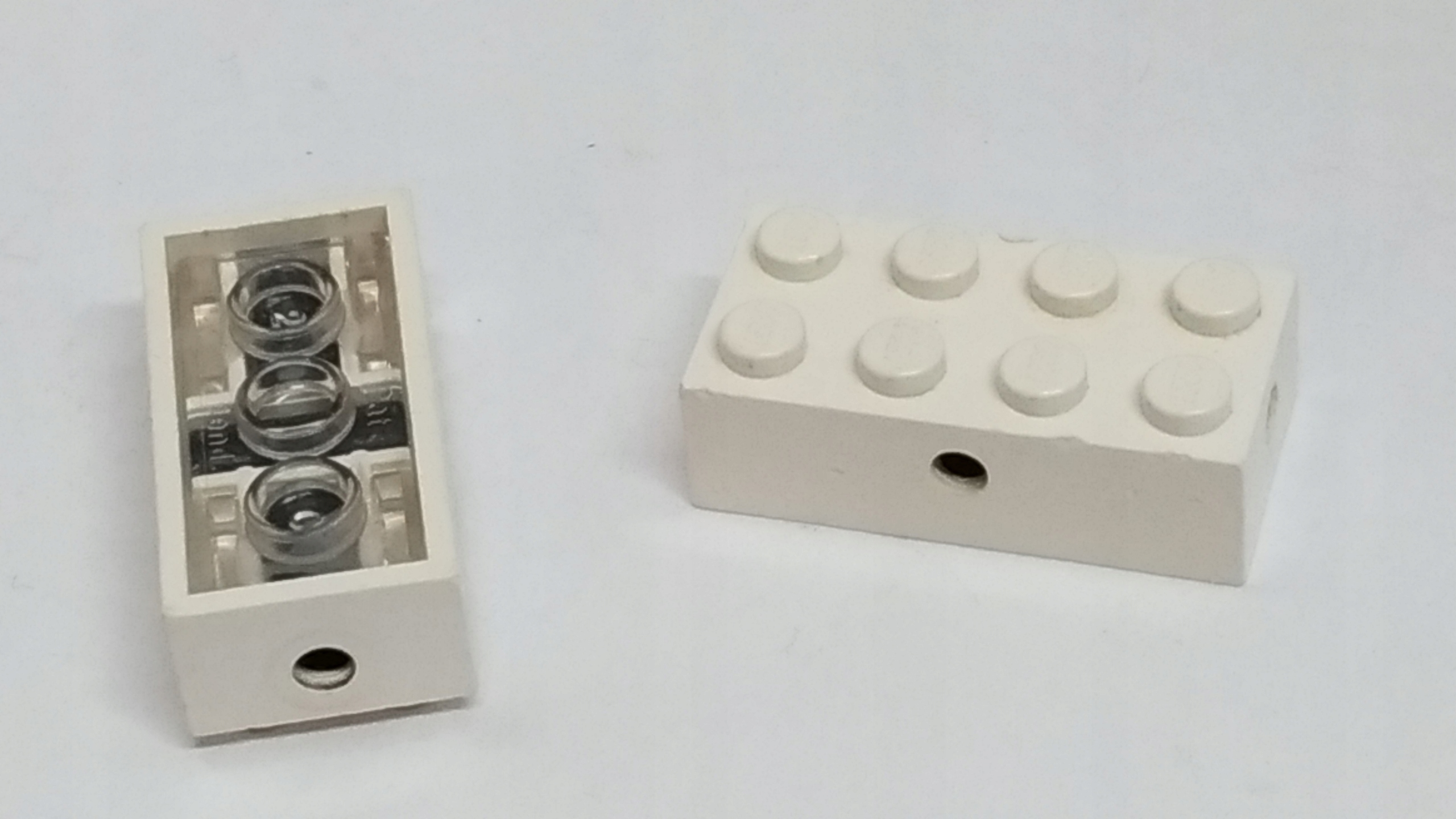 009g Lego 7049a PAT PEND NA OŚKI białe 2 szt 2 29ecc9168412783b06cd7f32e45ed92b